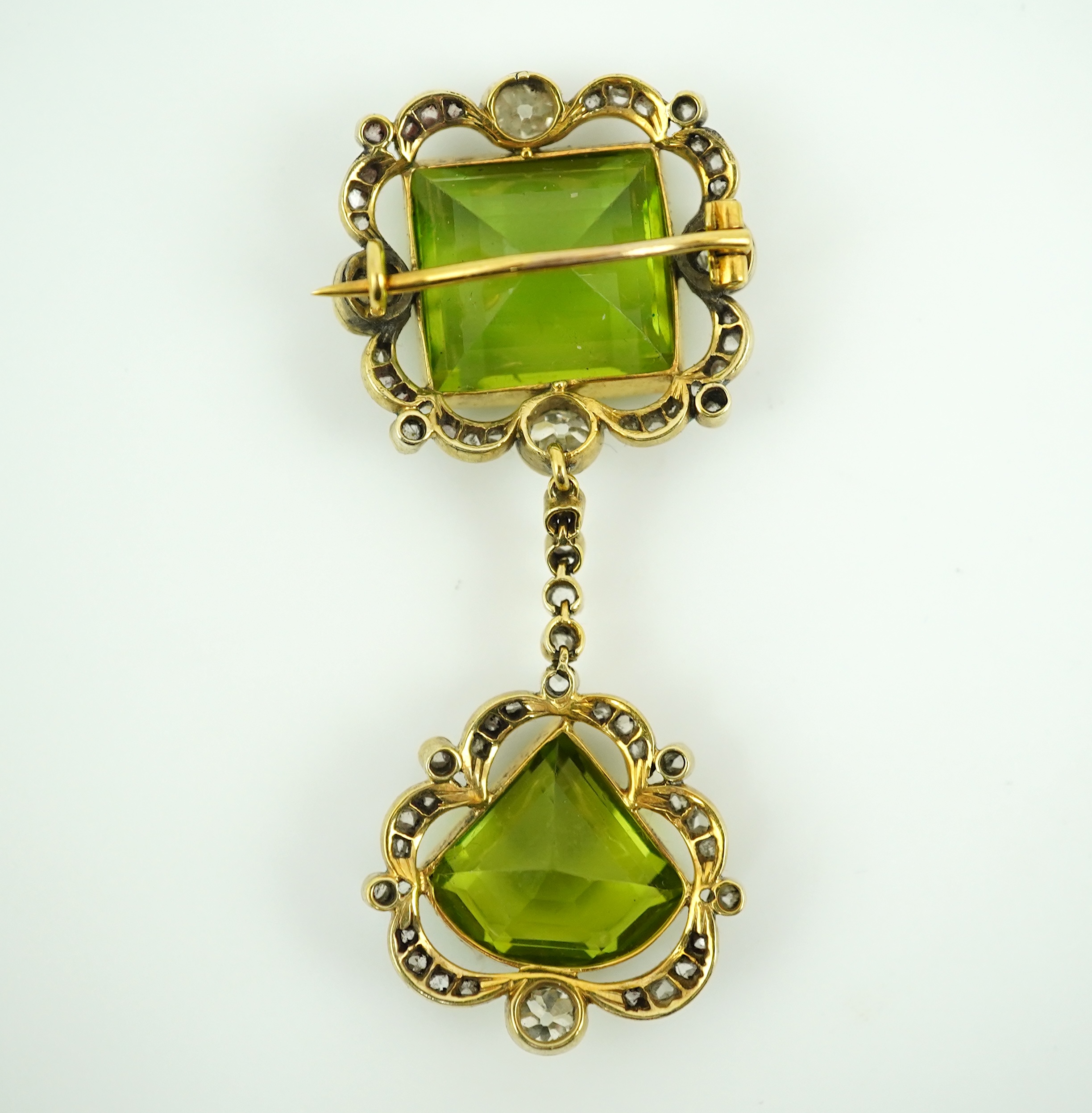 A peridot and diamond brooch, circa 1900